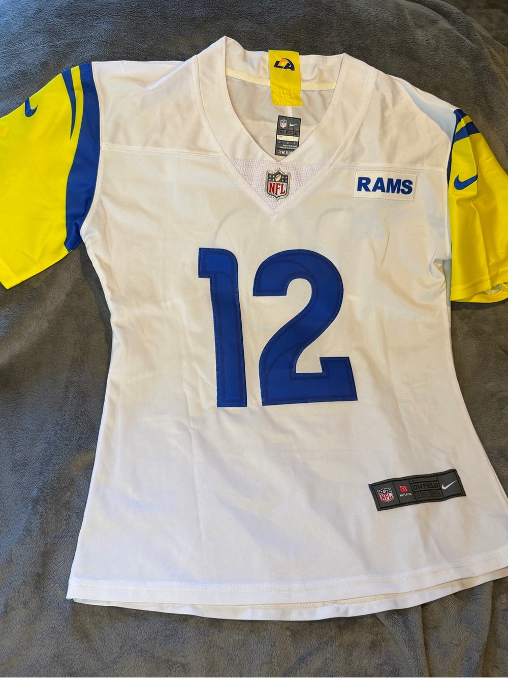 Mint condition women’s white Los Angeles Rams Puka Nacua  #12 Nike NFL Jersey